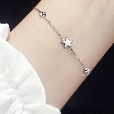 Square handmade bracelet with chain links, displayed in a sleek bracelet box, showcasing intricate design and craftsmanship.