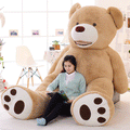 Large life-size teddy bear with soft brown fur and a friendly expression, perfect for cuddling or as a decorative gift.