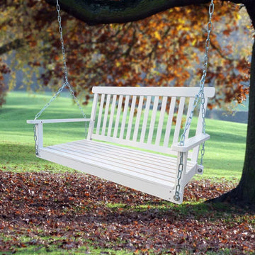 White wooden porch swing hanging from a sturdy frame, perfect for outdoor relaxation and classic porch décor.