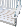 White wooden porch swing with classic design, featuring a sturdy frame and slatted seat, perfect for outdoor relaxation.