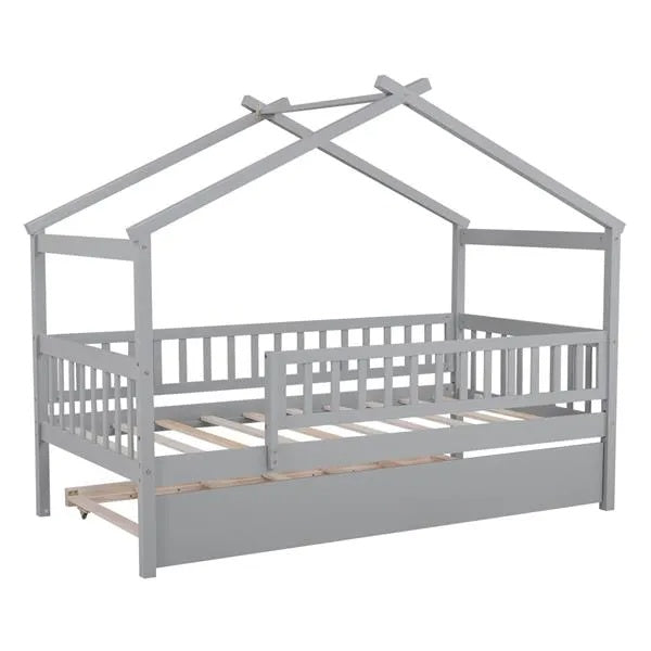 Twin size wooden house bed with attached trundle, featuring a cozy house-shaped frame and natural wood finish for a child's bedroom.