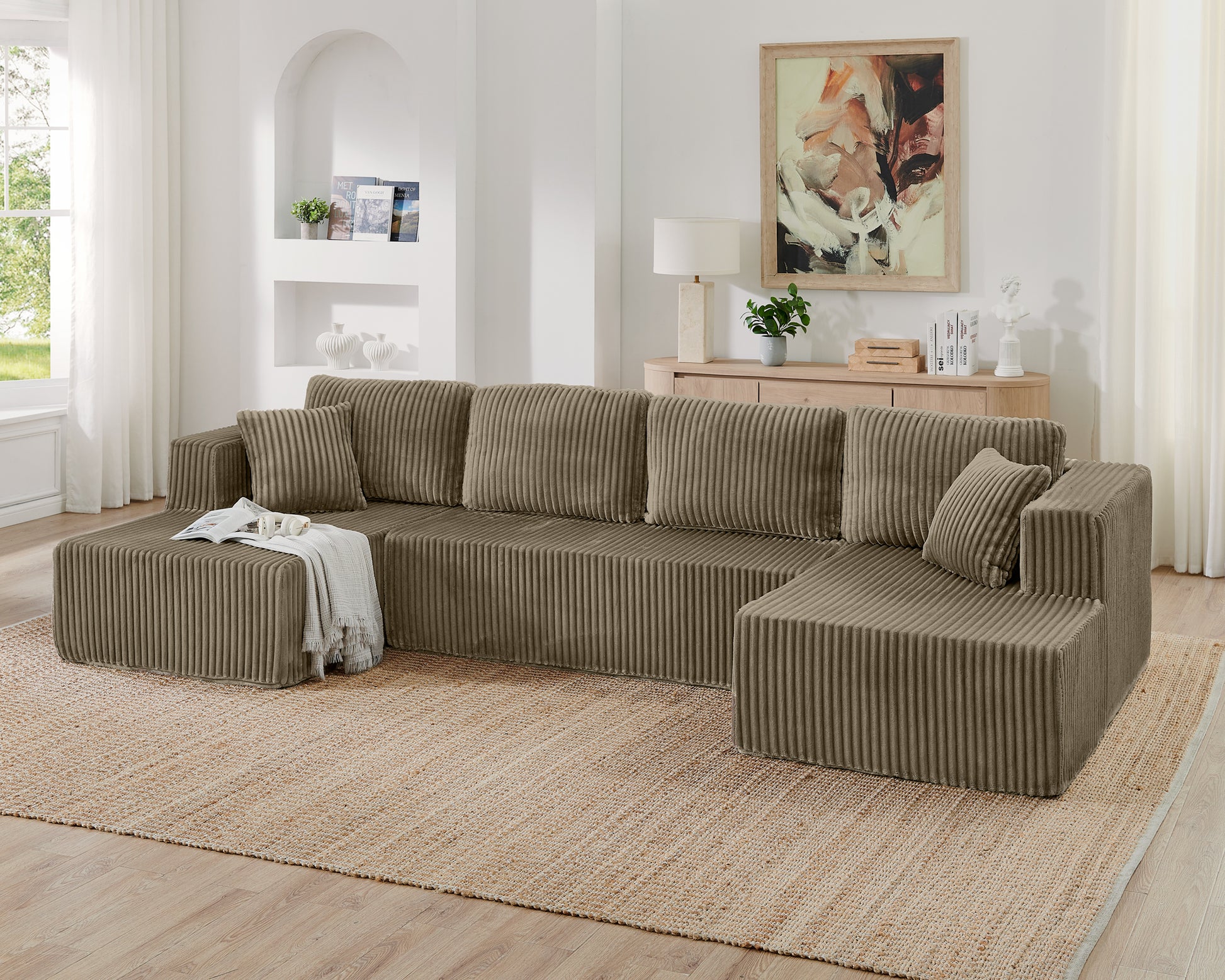 U-shaped modern sectional sofa with plush cushions, fabric upholstery, and sleek design, perfect for contemporary living rooms.