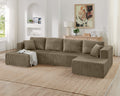 U-shaped modern sectional sofa with plush cushions and sleek design, shown in a contemporary living room setting.