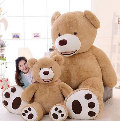 Large, life-size teddy bear with soft brown fur, plush paws, and friendly expression, perfect for cuddling and decorating.