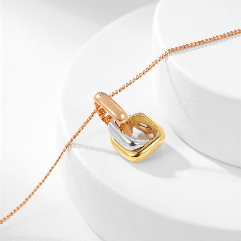 Square three-color interlocking ring necklace with clavicle chain, showcasing a stylish layered jewelry design.