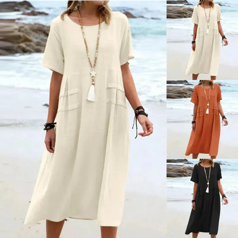 Women's summer loose casual midi dress in multiple colors by the beach.