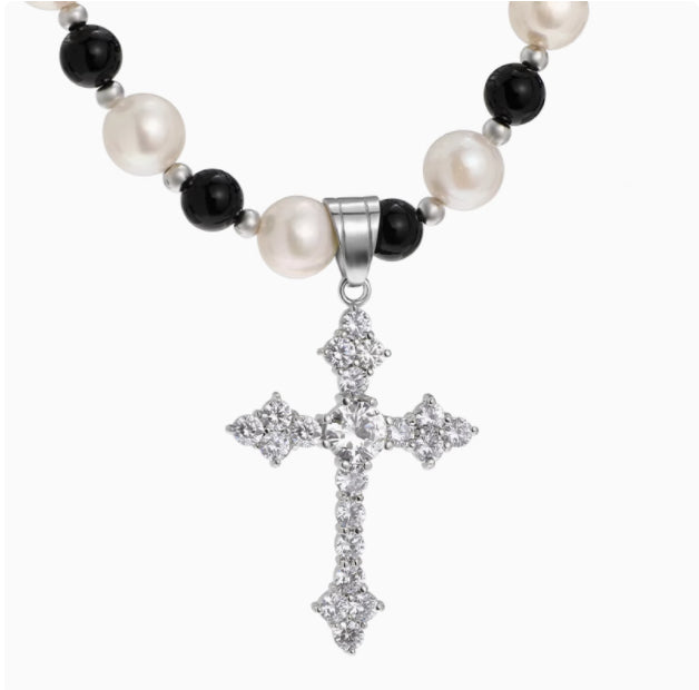 Black agate and freshwater pearl necklace with a cross pendant, featuring a elegant jewelry design.