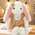 Soft bunny ragdoll plush toy with floppy ears and cuddly fur, perfect for hugging and snuggling.