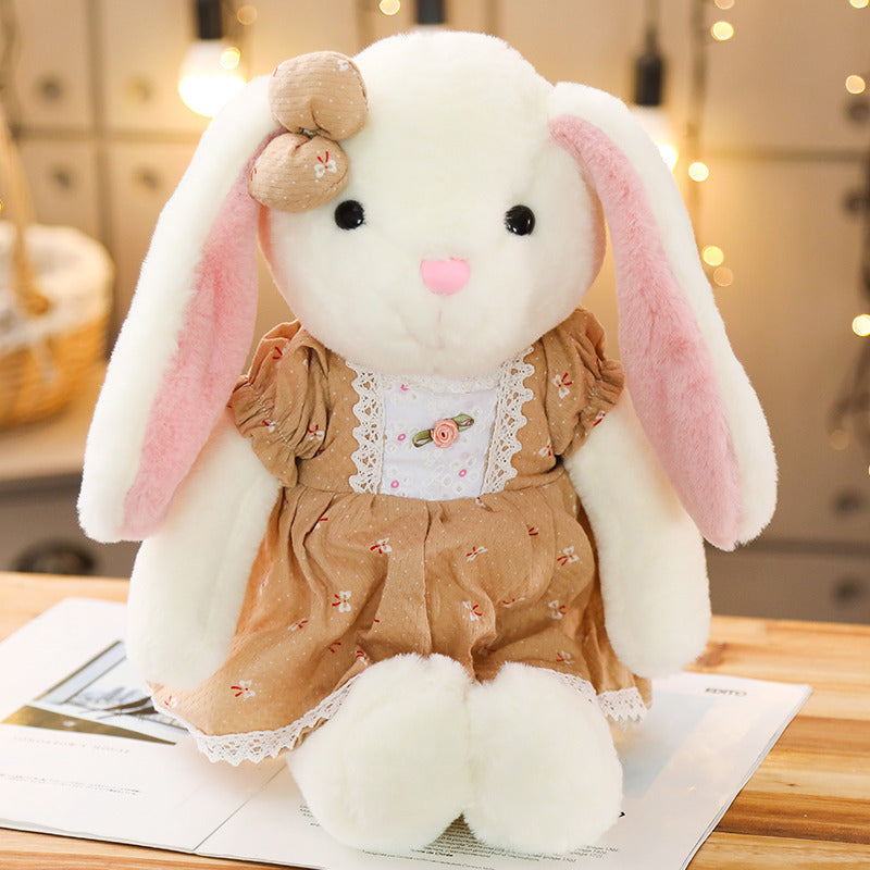 Soft bunny ragdoll plush toy with floppy ears and cuddly fur, perfect for hugging and snuggling.