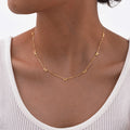 European and American style stainless steel necklace with flat cross and bow design, featuring a sleek, polished finish.