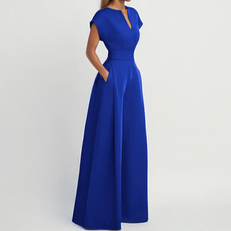 Architectural V-Neck Wide-Leg Jumpsuit in black, featuring a V-neckline and flowing wide-leg design, displayed on a mannequin.