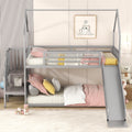 Twin over twin house bunk bed with slide and storage stairs, featuring a cozy wooden frame and built-in safety rails.