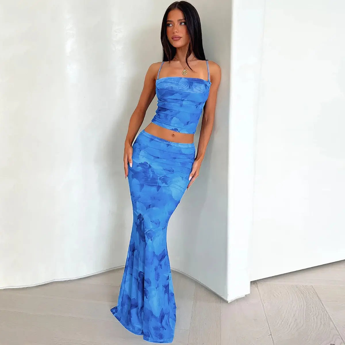 Niche spaghetti straps vest and sheath skirt set in blue floral print.
