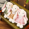 Soft bunny ragdoll plush toy with floppy ears and gentle features, ideal for cuddling and decorative display.