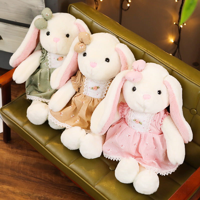 Soft bunny ragdoll plush toy with floppy ears and gentle features, ideal for cuddling and decorative display.