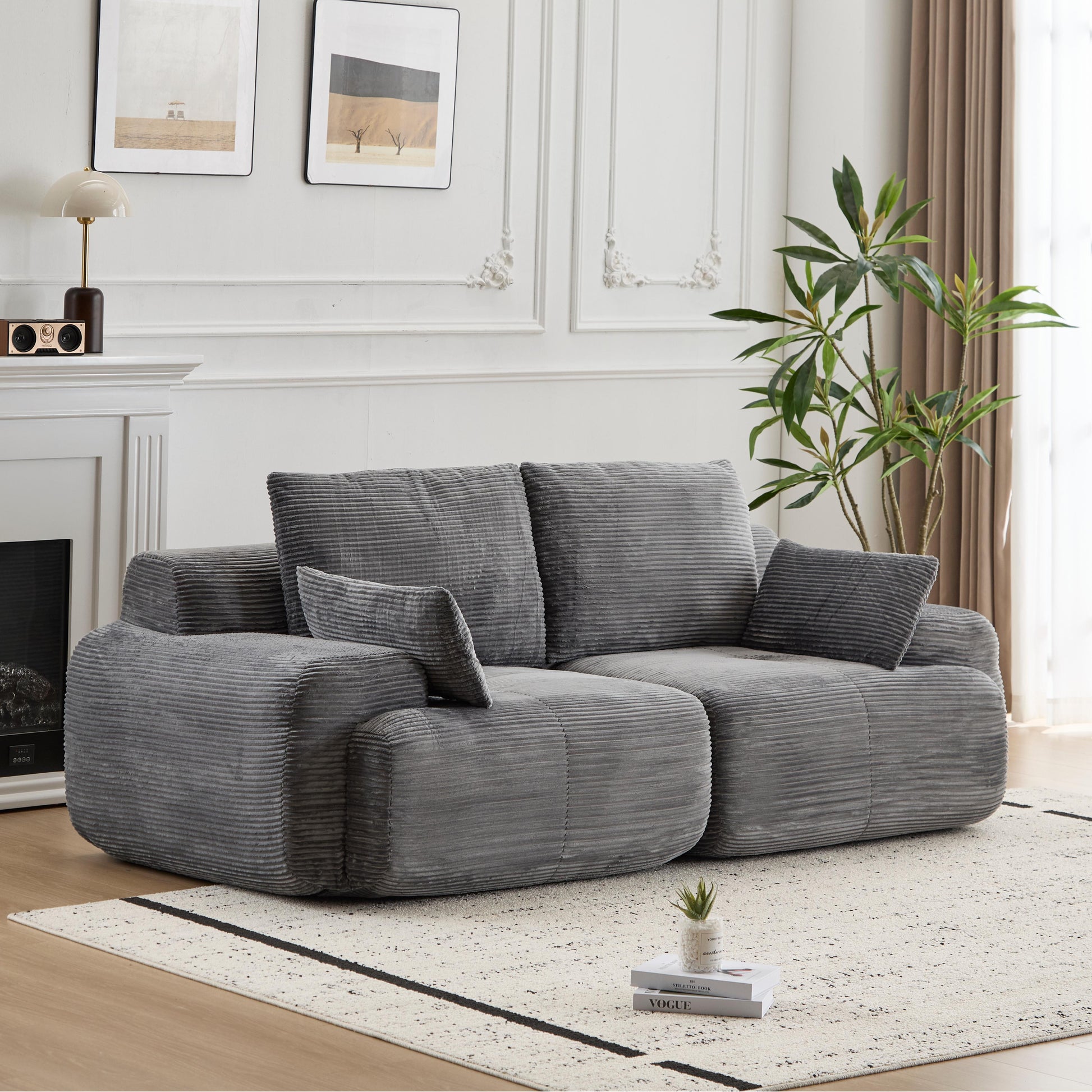 Luxury wide-wale corduroy cloud couch with plush cushions and modern design, perfect for stylish, comfortable living spaces.