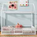 Twin modern wood house bed frame with a cozy house-shaped headboard and sturdy wooden construction, perfect for a child's bedroom.