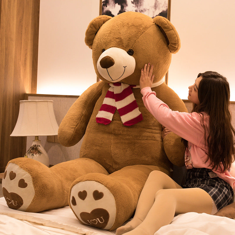 Large plush teddy bear action stuffed toy with soft fur, oversized bear doll perfect for cuddling and play.