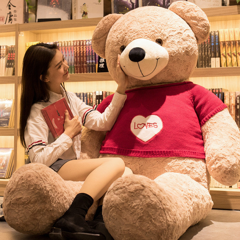 Large oversized teddy bear stuffed toy with soft fur, featuring a friendly face and big paws, perfect for cuddling and gifting.