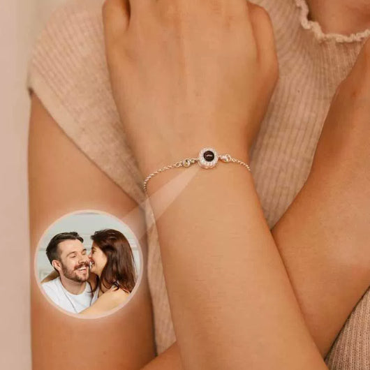 Unisex copper round birthstone bracelet with a polished finish, featuring a prominent colorful birthstone accent.