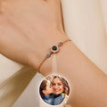 Unisex copper round birthstone bracelet featuring a shiny copper band and a central colorful birthstone gemstone.
