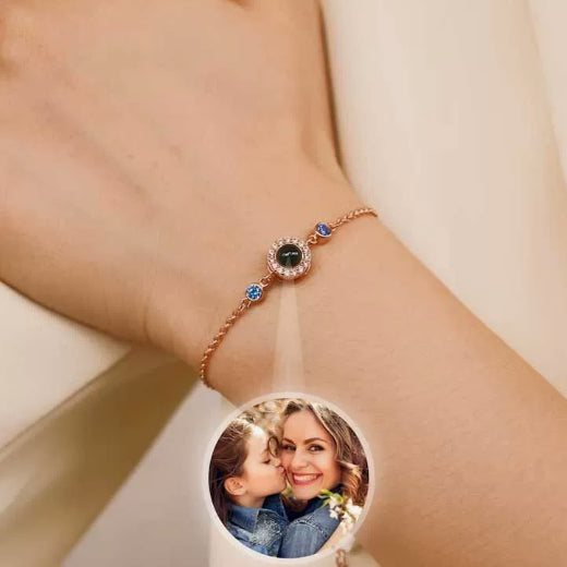 Unisex copper round birthstone bracelet featuring a shiny copper band and a central colorful birthstone gemstone.