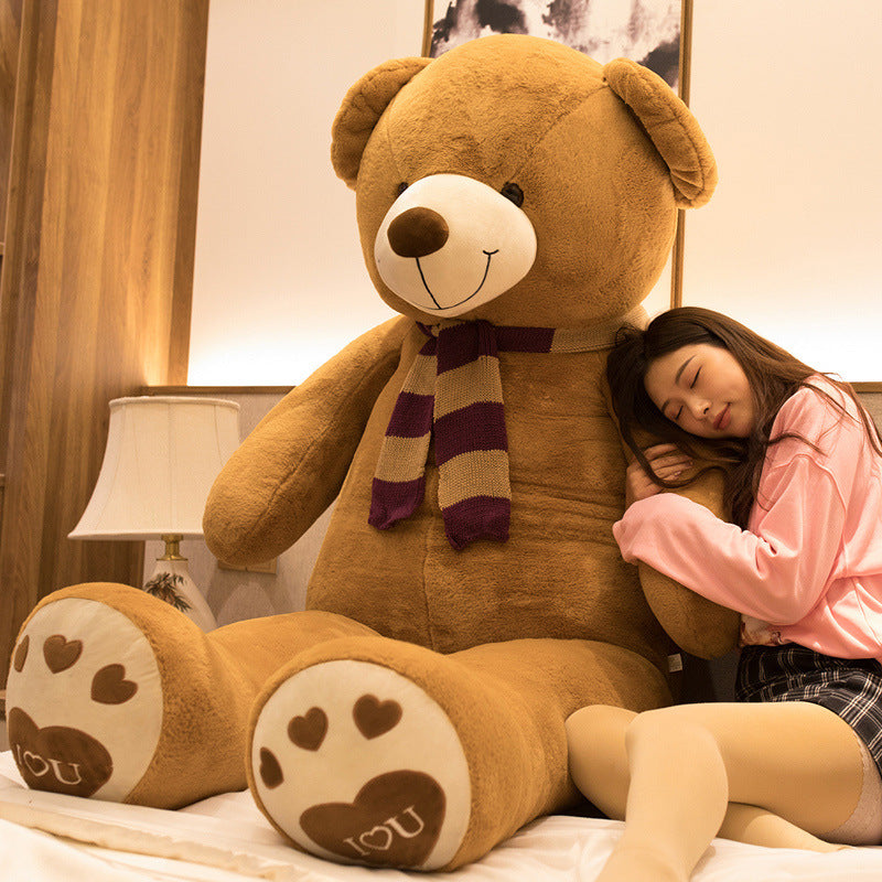 Large oversized teddy bear action stuffed toy with soft, plush fur and a friendly appearance, perfect for cuddling and gift-giving.