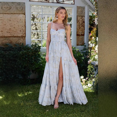 Backless floral chiffon dress for seaside vacation, sleeveless with high waist.