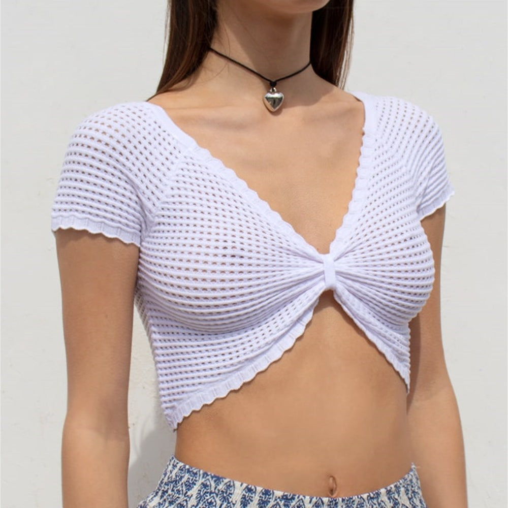 Women's white hollow-out short-sleeved chest-wrapped vest made of polyester fiber.