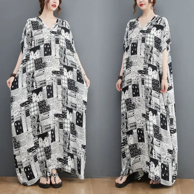 Plus size black and white dress with floral pattern, long skirt, cotton fabric.