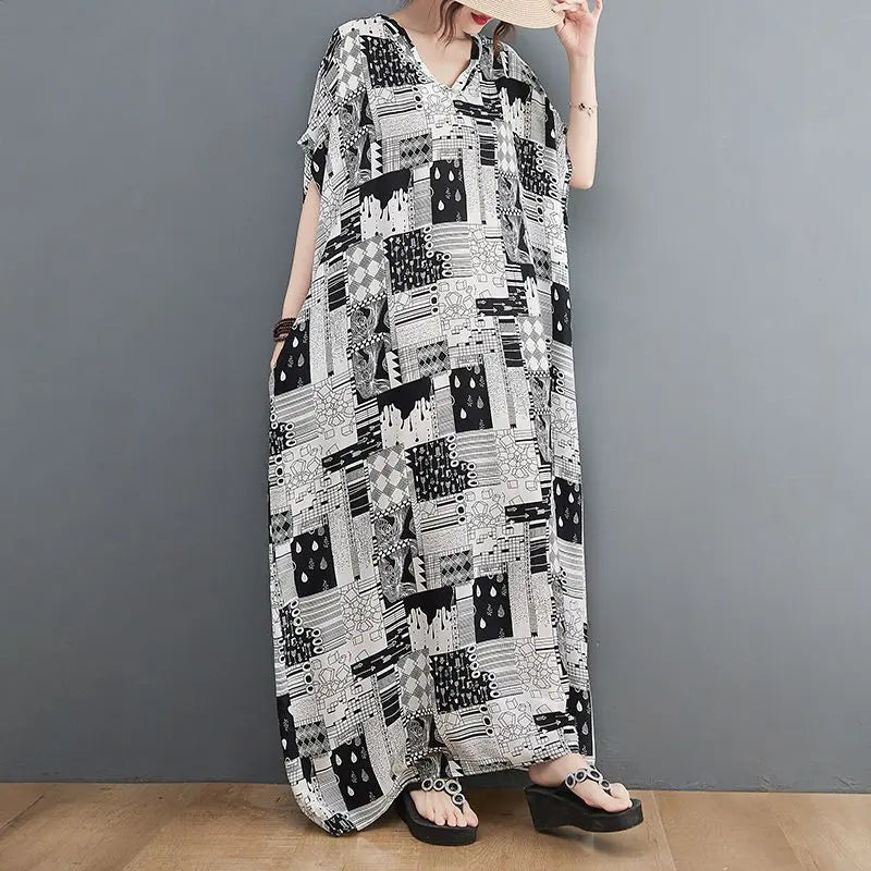 Plus size black and white dress with floral pattern, long skirt, cotton fabric.