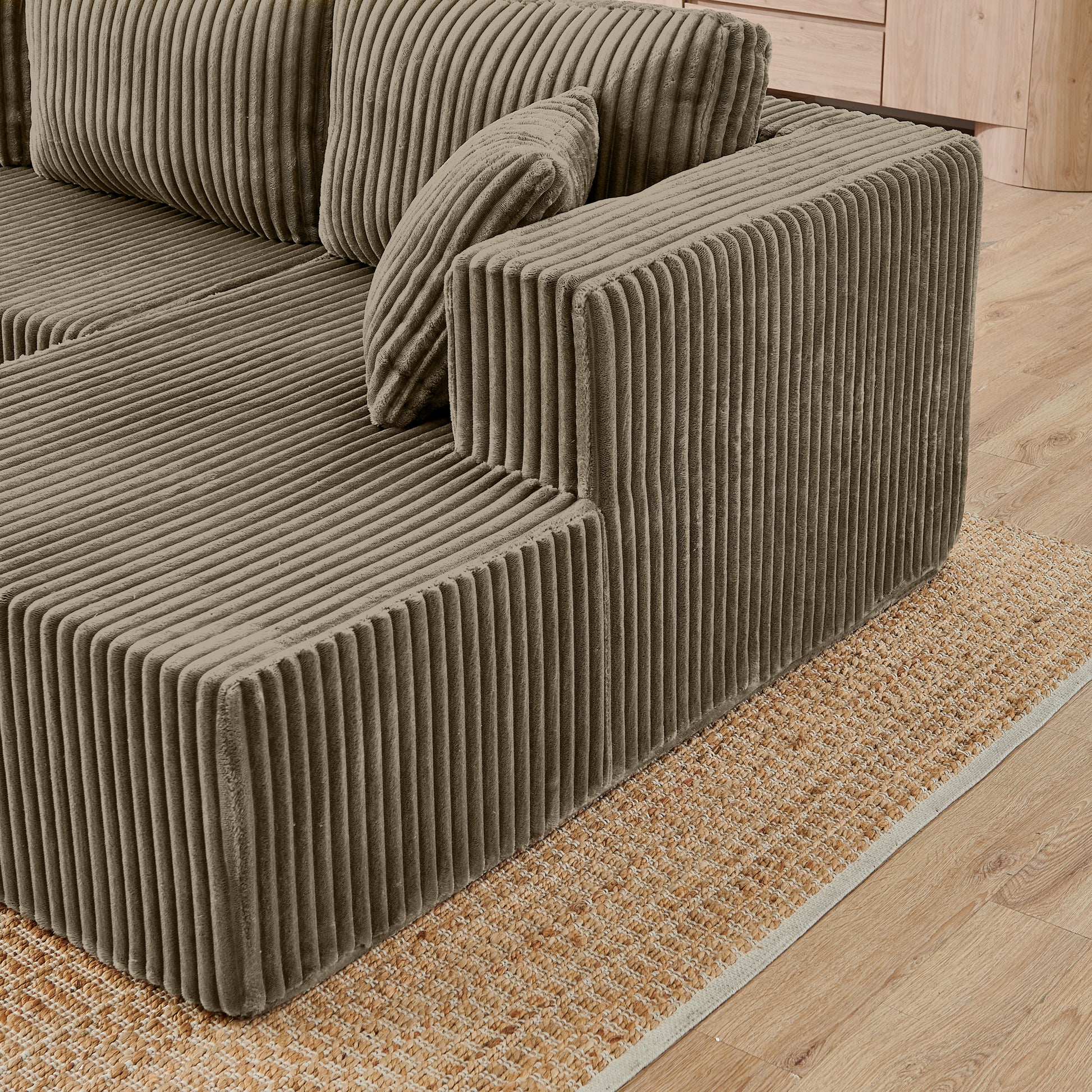 U-shaped modern sectional sofa with plush cushions and sleek design, perfect for contemporary living rooms.