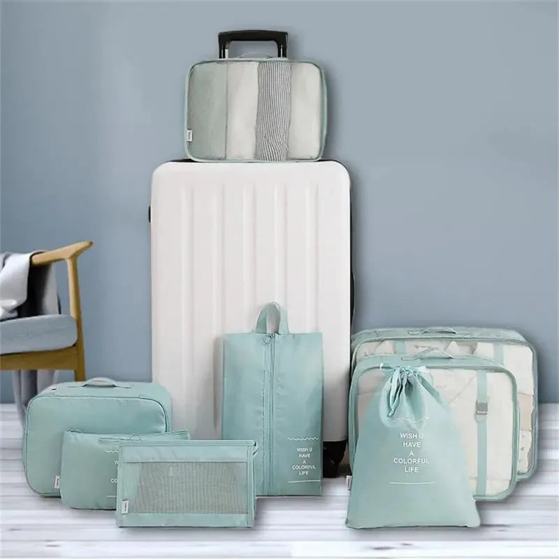 8-piece luggage divider bag set with travel storage organizers in various colors.