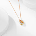 Square three-color ring necklace featuring interlocking clavicle chain design, showcasing vibrant metal rings on a delicate chain.