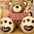 Large plush teddy bear action stuffed toy with soft fur and oversized design, perfect for cuddling and display.