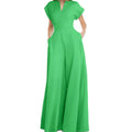 Architectural V-Neck Wide-Leg Jumpsuit in neutral fabric, featuring a stylish V-neckline and flowing wide-leg design.