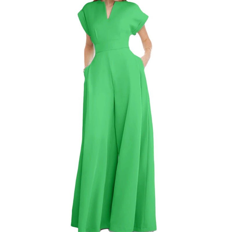Architectural V-Neck Wide-Leg Jumpsuit in neutral fabric, featuring a stylish V-neckline and flowing wide-leg design.