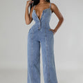 Light blue denim jumpsuit with suspenders, featuring a mid-waist and straight-leg design, ideal for women's fashion.