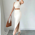 Milky white knitted sleeveless sweater vest and split skirt set for women.