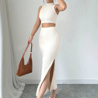 Milky white knitted sleeveless sweater vest and split skirt set for women.