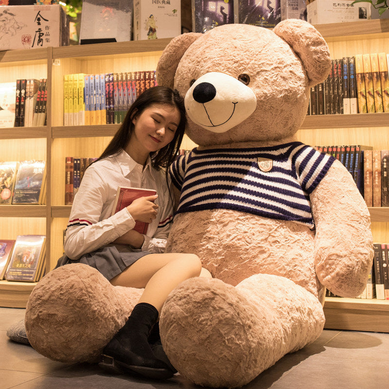 Large oversized teddy bear action stuffed toy with soft fur and big paws, perfect as a cuddly bear doll for comfort and play.