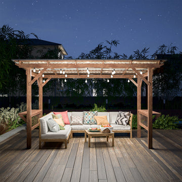 Wooden 13x6.5-foot pergola gazebo with metal roof, string bulbs, and bar counters, ideal for outdoor grilling and entertaining.