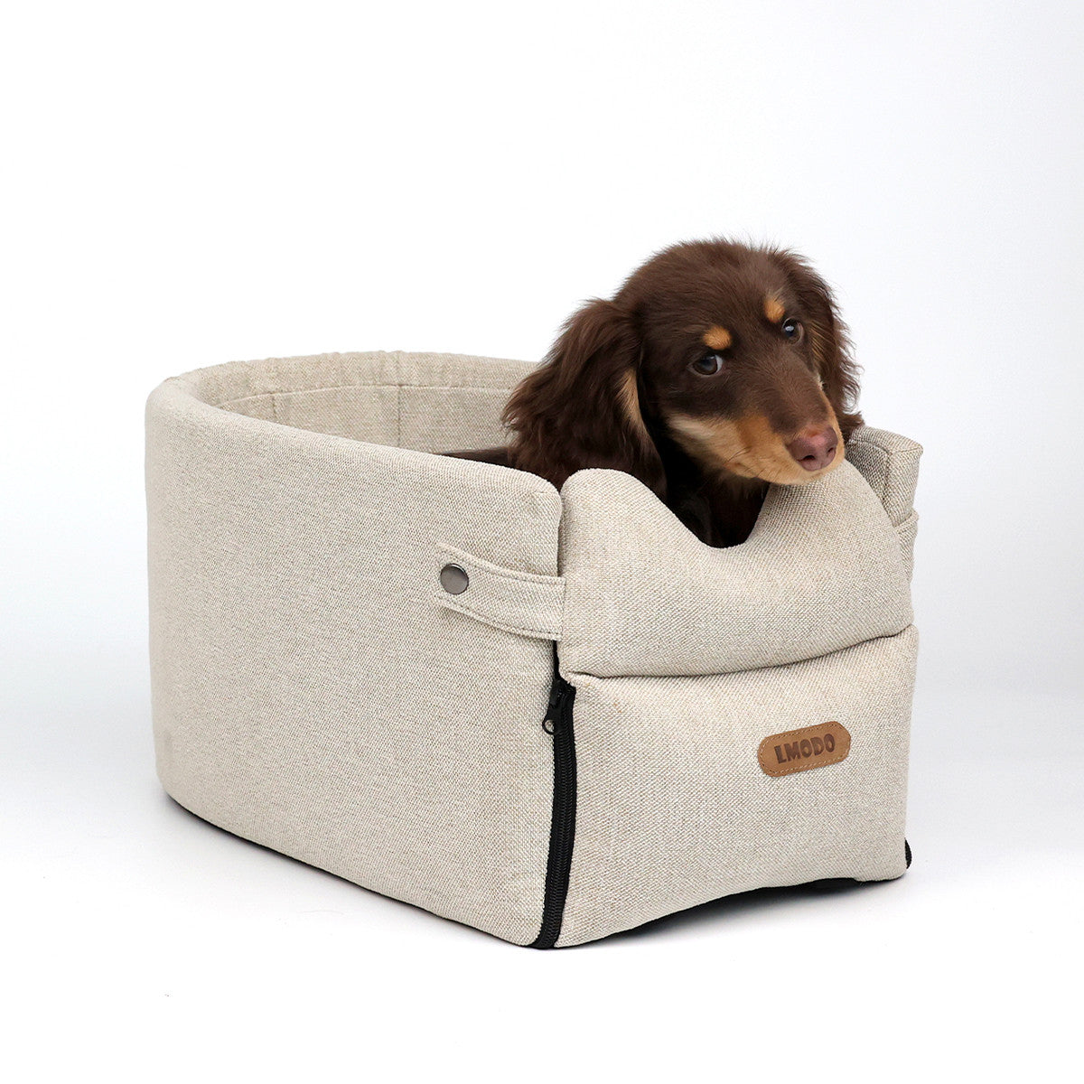 Luxury central console dog car seat with plush padding and safety straps for comfortable pet travel in vehicles.