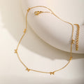 European and American style stainless steel necklace with flat cross chain and bow pendant, showcasing a stylish and elegant design.