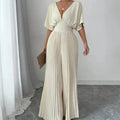 Elegant and comfortable cream-colored dress jumpsuit for women.